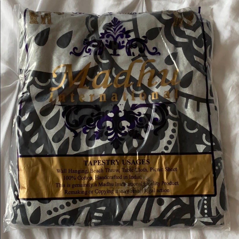 Tapestry still in packaging